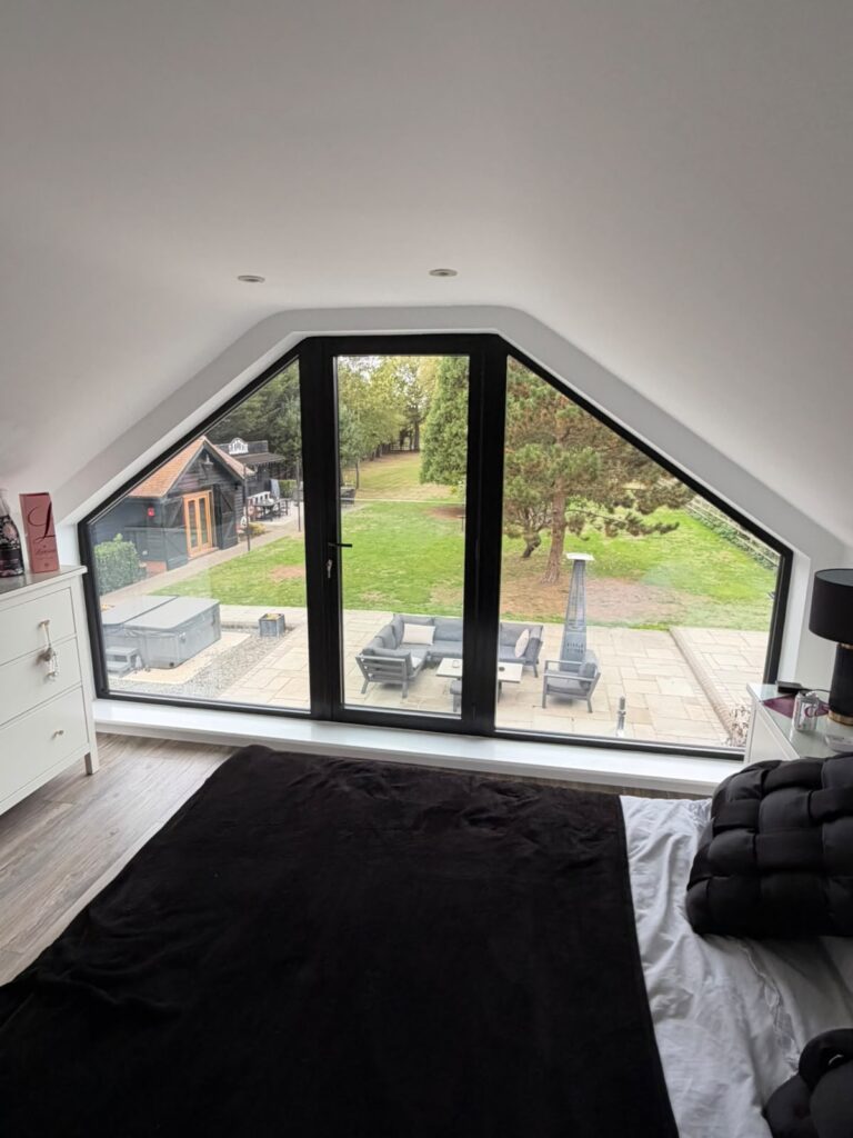 Basildon Interior view of the gable opening and central glazed door overlooking the garden.